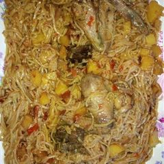 A picture of Taliyar Hausa with Irish and chicken.