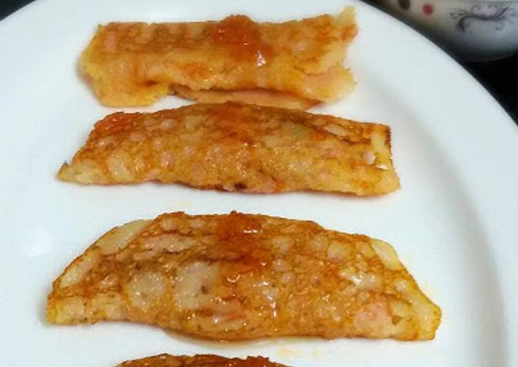 Gajar R Patisapta (Eggless Sweet Carrot Crepes Stuffed with Carrot Pudding and Served with Carrot Syrup)