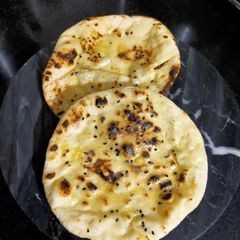A picture of Garlic Butter Naan With Yeast.