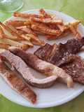 Entrecotte y secreto con patatas