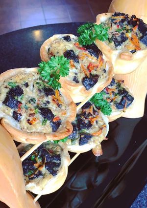 Una foto de Canastitas de morcilla y verduras