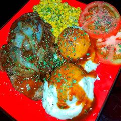 A picture of Mike's 10 Minute Smothered Pork Loin Chop Complete Meal.