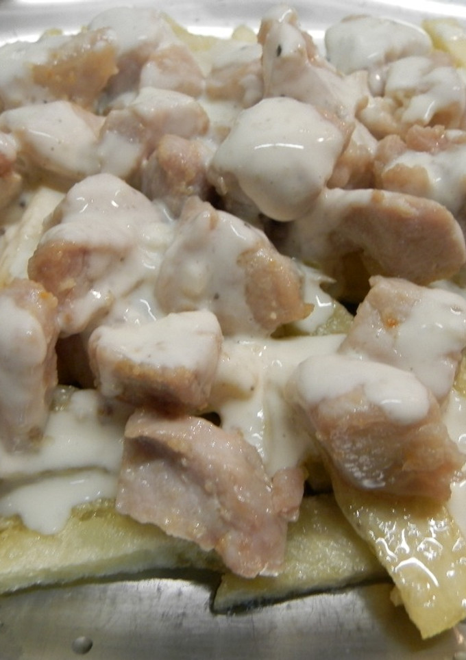 Una foto de Lomo de cerdo con salsa de queso
