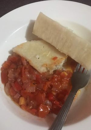 A picture of Boiled Yam with Tomatoes Sauce.