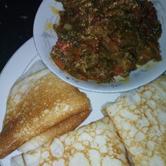 A picture of Sinasir with spinach soup.