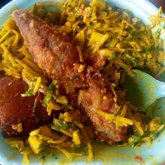 A picture of Abacha with fried fish.