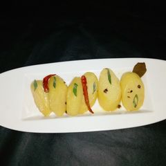 A picture of Spicy Buttered potatoes.