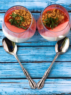 A picture of Panna Cotta with Raspberry Coulis.