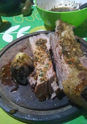 Una foto de Asado a la parrilla de costillas con 5 hs de cocción y sencillo