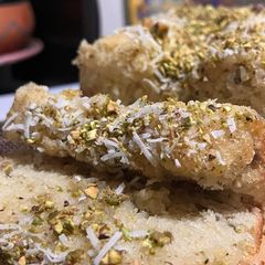 LEMON, COCONUT, AND PISTACHIO CAKE A picture of LEMON, COCONUT, AND PISTACHIO CAKE.