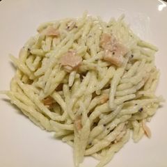 A picture of Fresh pasta with salmon, cream and caviar.