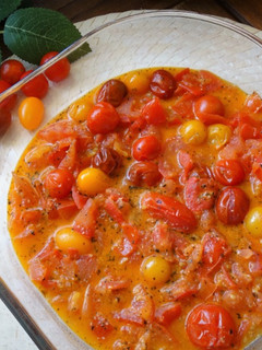 Una foto de Tomates en salsa