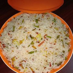 A picture of Mixed vegetable and egg fried rice.