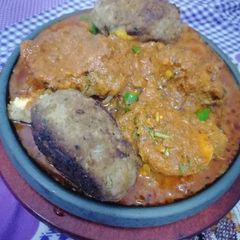 Sizzling Dinosaur eggs nargisi kofta A picture of Sizzling Dinosaur eggs nargisi kofta.