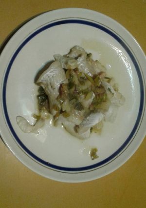 Una foto de Filet de merluza al verdeo