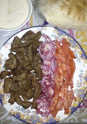 A picture of Beef Shawarma 🥩🍅🧅😋.