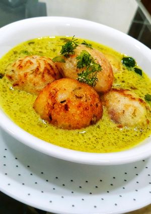 A picture of Moong Dal Appe with Peanut Curry.