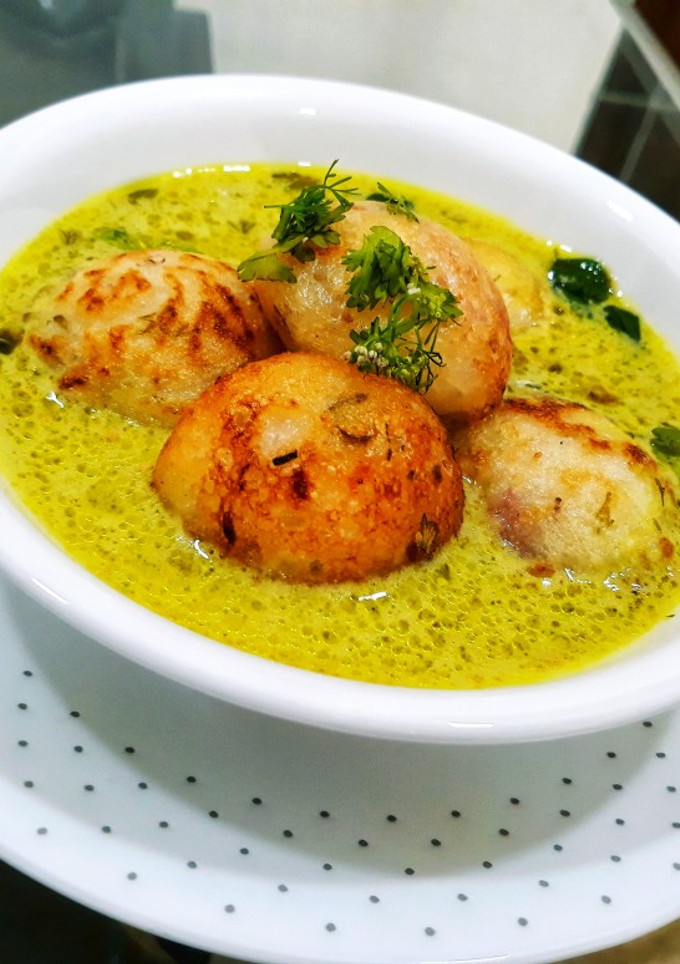 A picture of Moong Dal Appe with Peanut Curry.