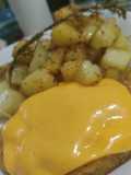 Milanesa de no pollo vegana con papas doble cocción