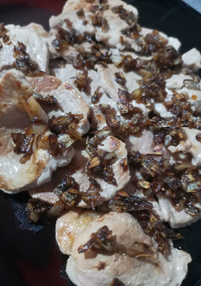 Una foto de Solomillos con cebolla caramelizada