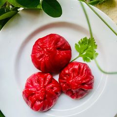A picture of Red Hot Steamed Momos.