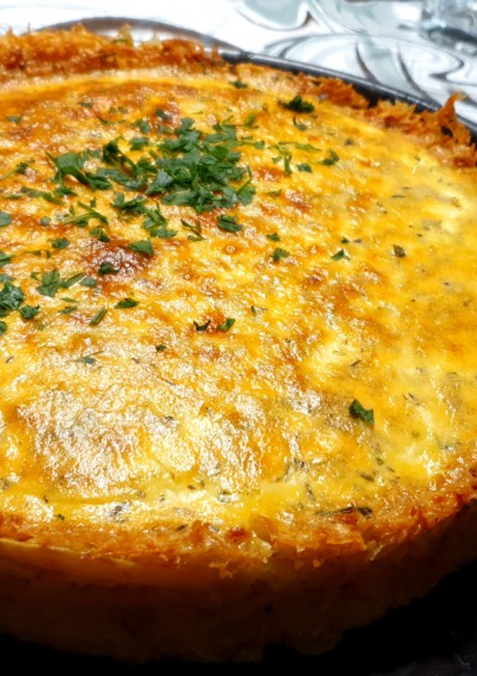 Una foto de Tarta de papas rosti con panceta