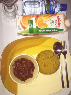 A picture of Fried cous cous and beef sauce.