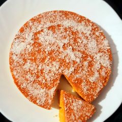 A picture of Eggless Coconut And Custard Cake.