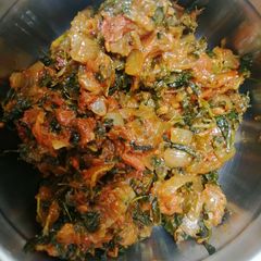 A picture of Tomato Methi curry.
