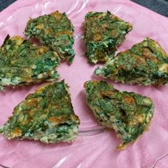 A picture of Crustless Spinach Egg Cheese Pie.