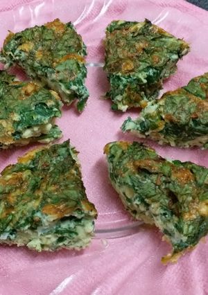 A picture of Crustless Spinach Egg Cheese Pie.