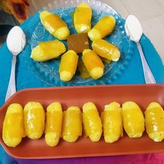 A picture of Suji aamsatto (semolina mango papad) sweet.