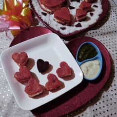 A picture of Paneer Coconut stuffed Beetroot Dhokla.