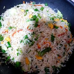 A picture of Fried rice with chicken chilli dry.
