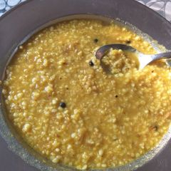 A picture of Wheat dalia with moong dal.