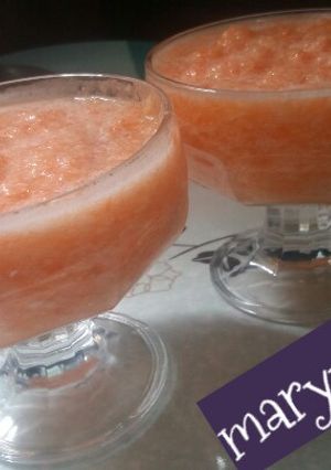 A picture of Pineapple and carrot juice.