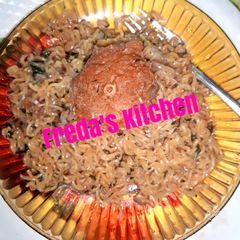 Indomie with fish and scent leaf A picture of Indomie with fish and scent leaf.