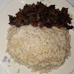 A picture of Vegetable sauce with pasta.