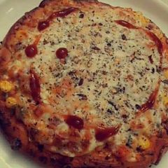 A picture of Cheese corn pizza.