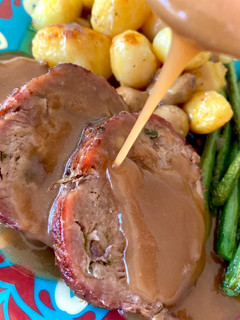 Una foto de Asado con Salsa Española