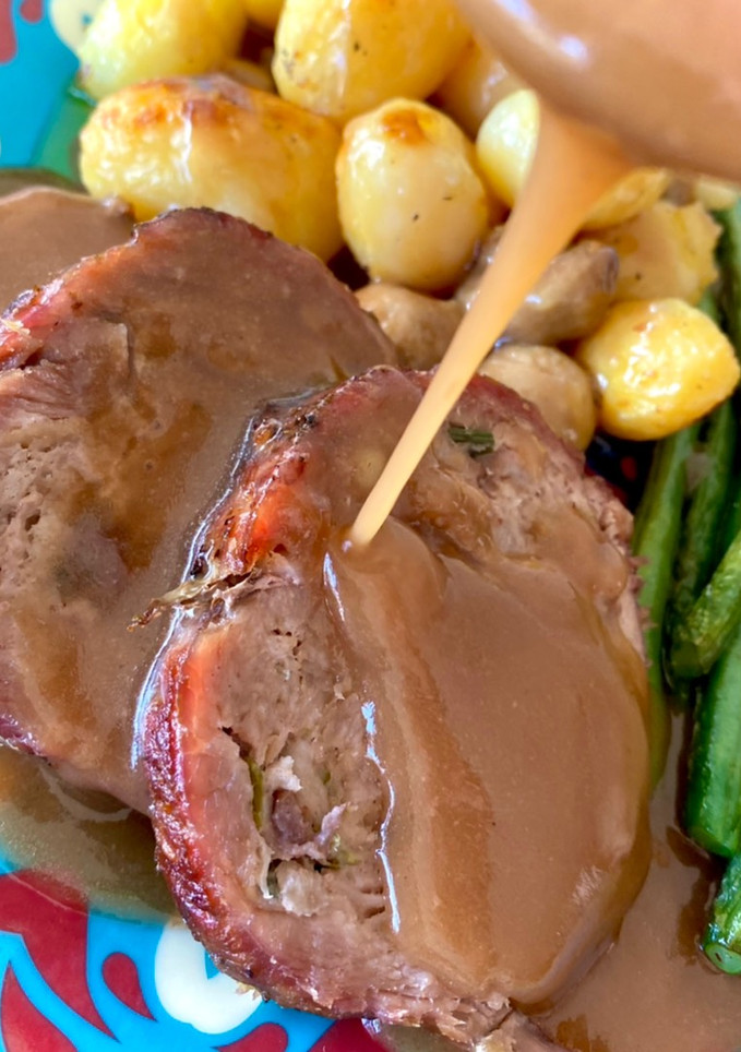 Una foto de Asado con Salsa Española