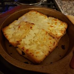 A picture of Toast with cheese 🧀 potatoes 🥔 meat 🍖.
