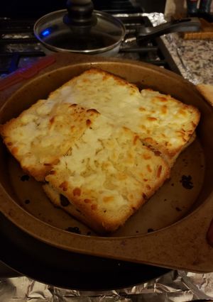 A picture of Toast with cheese 🧀 potatoes 🥔 meat 🍖.