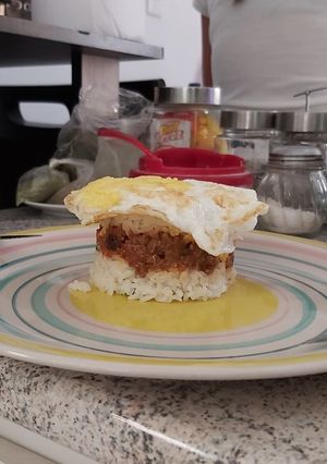 Una foto de Arroz tapado
