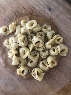 Una foto de Tortellinis en salsa de champiñón