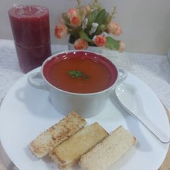 A picture of Tomato 🍅carrot 🥕beetroot soup.