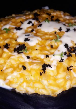 Foto di Risotto zucca, zola, olive, timo