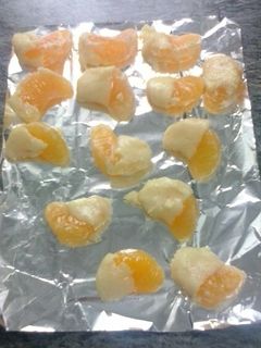 Una foto de Gajos de mandarinas con chocolate