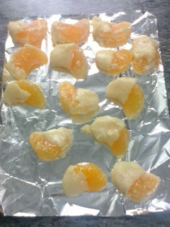 Una foto de Gajos de mandarinas con chocolate