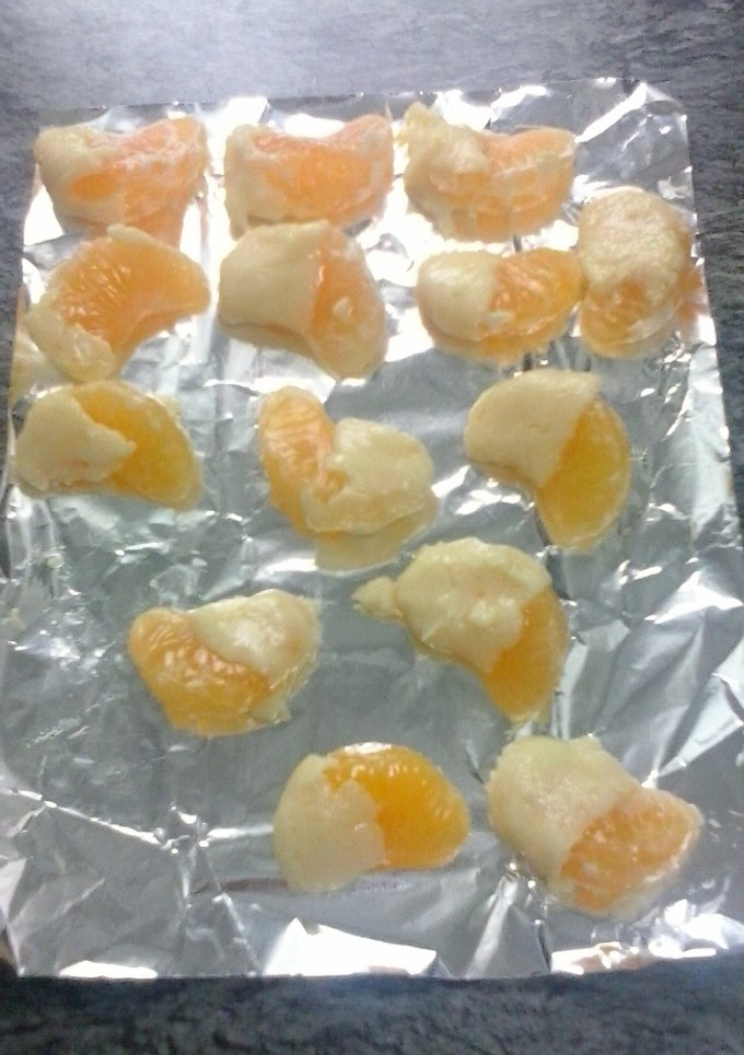 Una foto de Gajos de mandarinas con chocolate
